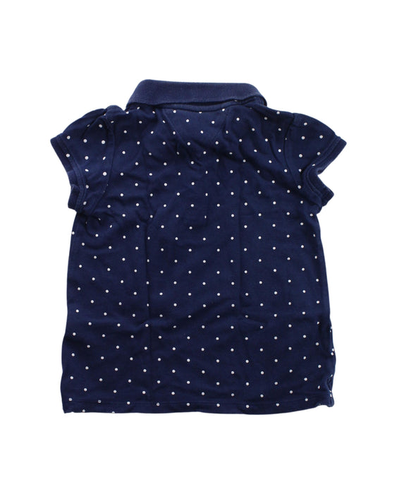 A Blue Short Sleeve Polos from Tommy Hilfiger in size 3T for girl. (Back View)