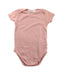 A Pink Short Sleeve Bodysuits from Bonpoint in size 12-18M for girl. (Front View)