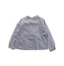 A Blue Long Sleeve Tops from Jacadi in size 5T for girl. (Front View)