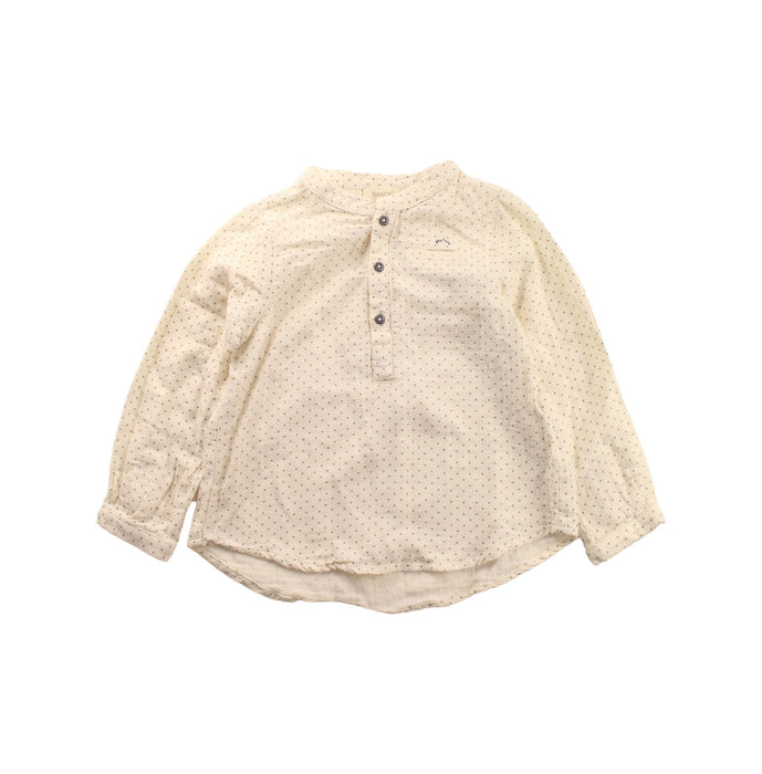A White Long Sleeve Tops from Nanos in size 4T for girl. (Front View)