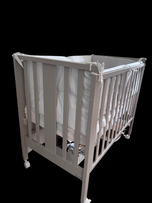A White Cots & Cribs from Chicco in size 0-3M for neutral. (Front View)
