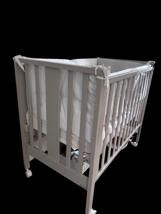 A White Cots & Cribs from Chicco in size 0-3M for neutral. (Front View)