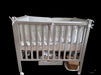 A White Cots & Cribs from Chicco in size 0-3M for neutral. (Back View)