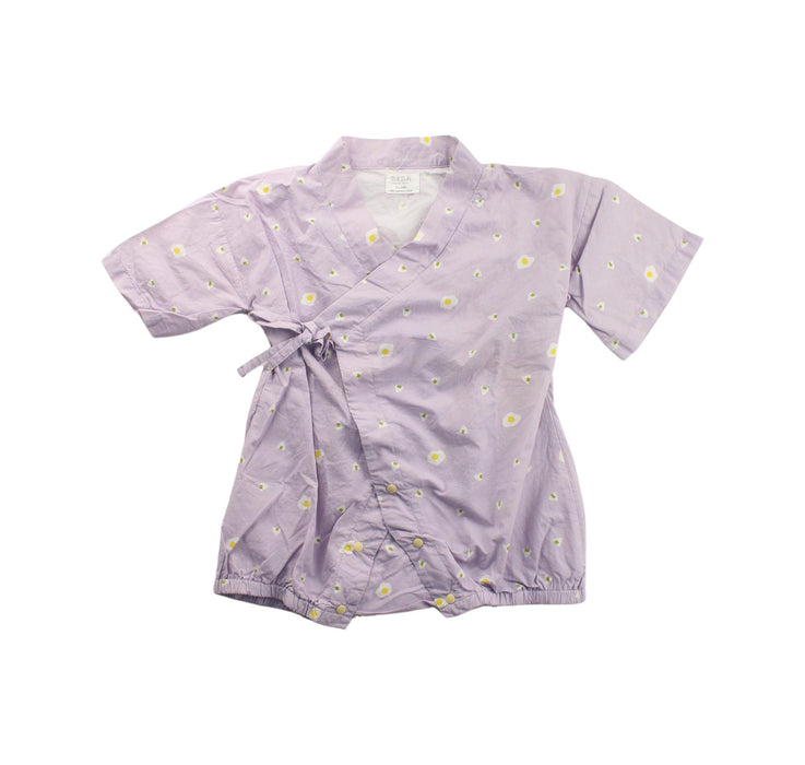 A Purple Short Sleeve Rompers from Naomi Wear in size 12-18M for girl. (Front View)