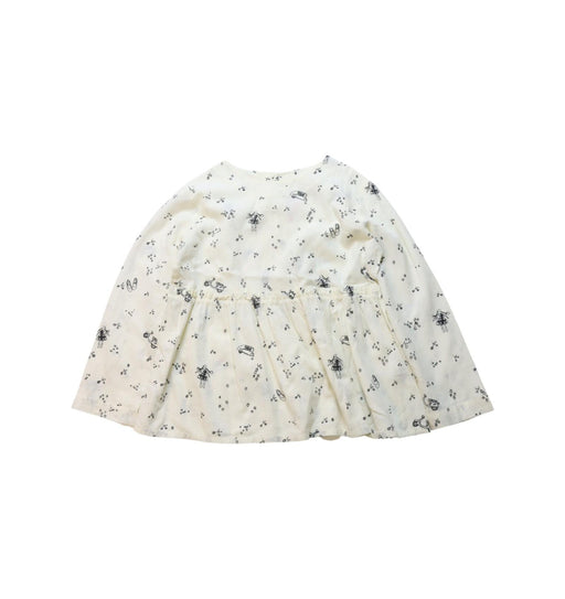 A Black Long Sleeve Tops from Bonpoint in size 4T for girl. (Front View)