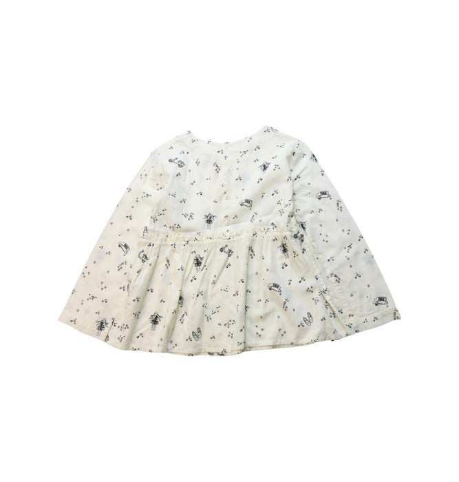 A Black Long Sleeve Tops from Bonpoint in size 4T for girl. (Back View)