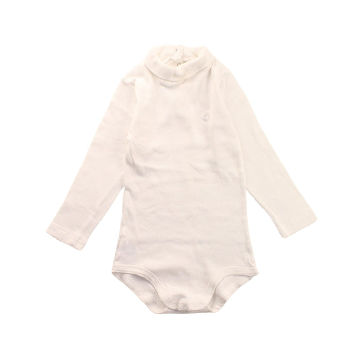 A White Long Sleeve Bodysuits from Petit Bateau in size 18-24M for girl. (Front View)