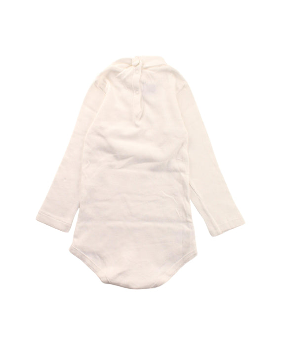 A White Long Sleeve Bodysuits from Petit Bateau in size 18-24M for girl. (Back View)