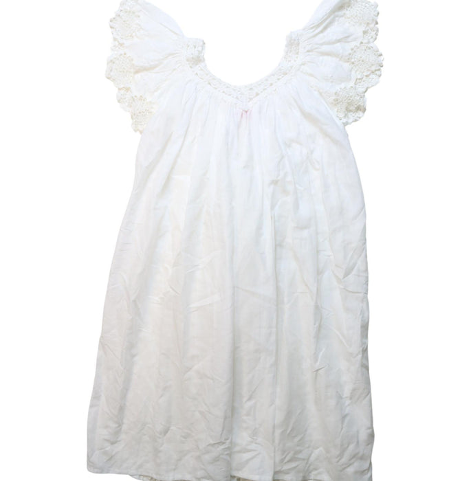 A White Short Sleeve Dresses from Coco and Ginger in size 7Y for girl. (Back View)