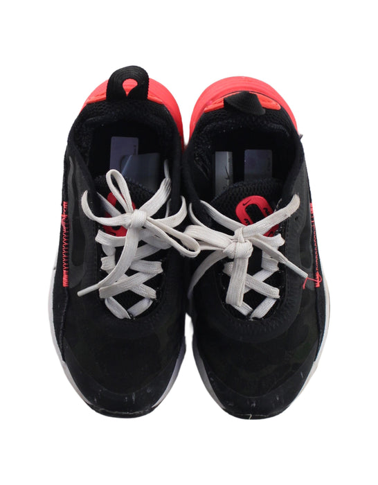 A Black Sneakers from Nike in size 5T for boy. (Back View)