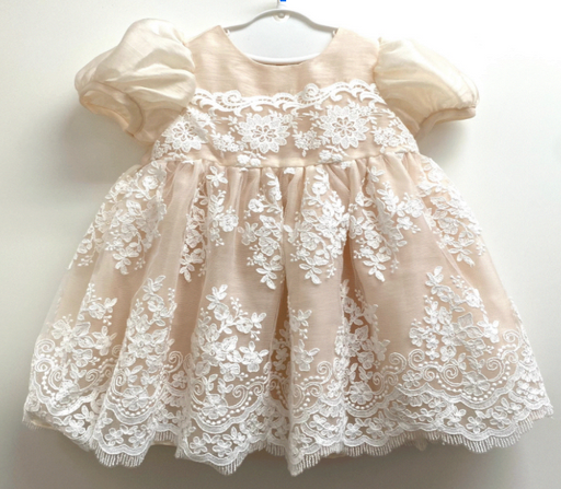 A Peach Short Sleeve Dresses from Saut de Lange in size 6T for girl. (Front View)