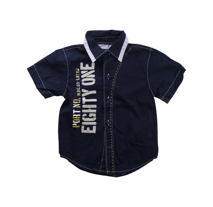 A Blue Short Sleeve Shirts from Guess in size 3T for boy. (Front View)