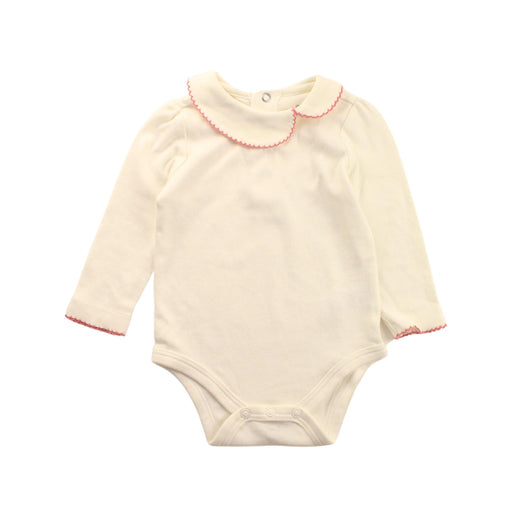 A White Long Sleeve Bodysuits from Mides in size 3-6M for girl. (Front View)