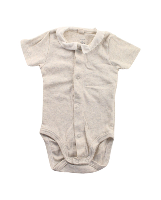 A White Short Sleeve Bodysuits from Petit Bateau in size 0-3M for girl. (Front View)