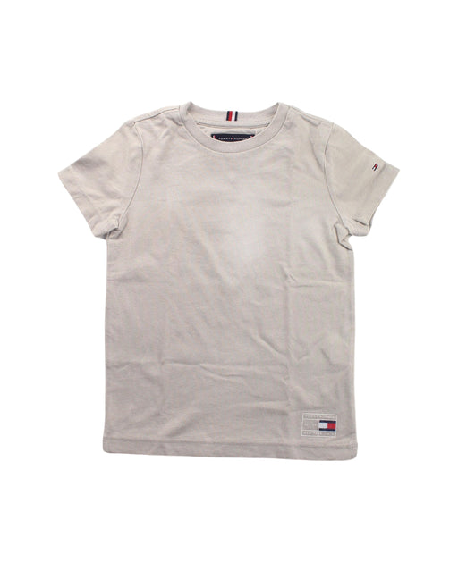 A Beige Short Sleeve T Shirts from Tommy Hilfiger in size 5T for girl. (Front View)