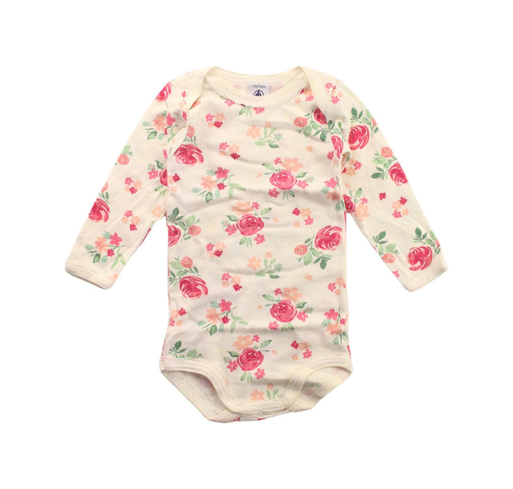 A White Long Sleeve Bodysuits from Petit Bateau in size 6-12M for girl. (Front View)