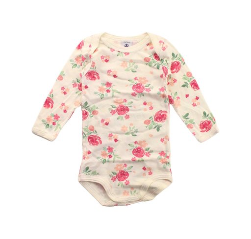 A White Long Sleeve Bodysuits from Petit Bateau in size 6-12M for girl. (Front View)