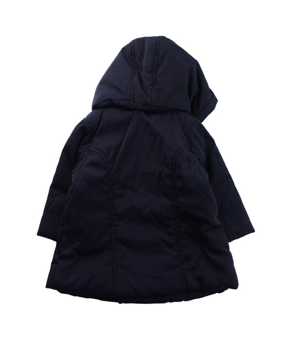 A Blue Coats from Jacadi in size 6-12M for girl. (Back View)