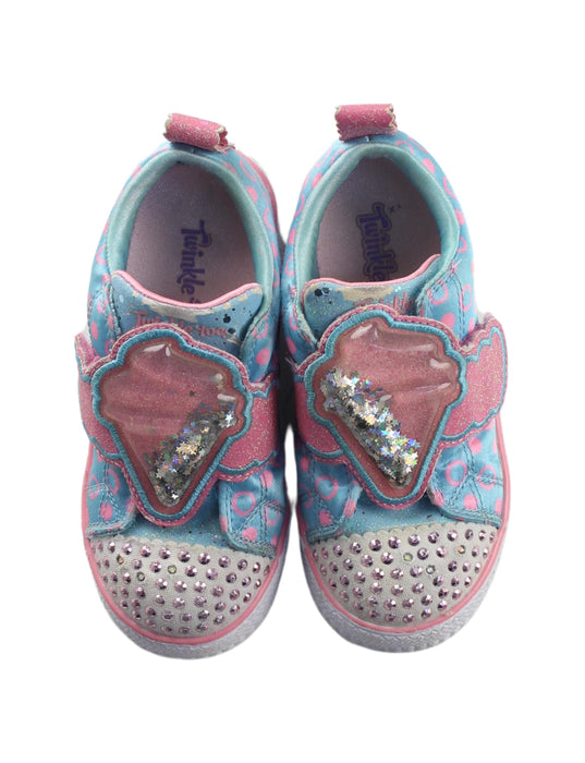 A Blue Slip Ons from Skechers in size 3T for girl. (Back View)
