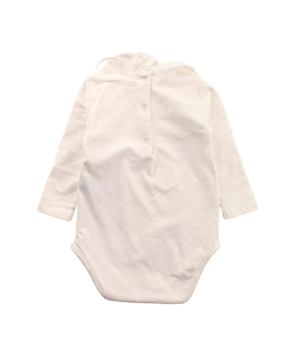A White Long Sleeve Bodysuits from Knot in size 3-6M for girl. (Back View)