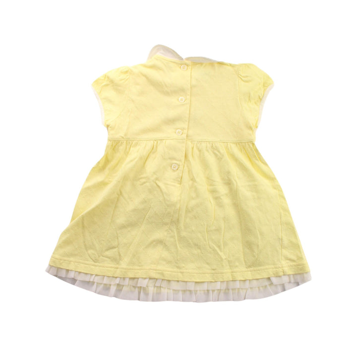 A Yellow Short Sleeve Dresses from Familiar in size 12-18M for girl. (Back View)