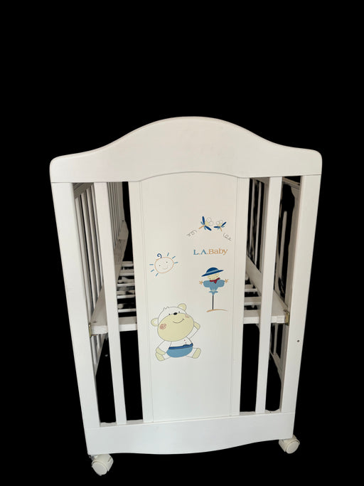 A White Cots & Cribs from LA Baby in size Newborn for neutral. (Front View)