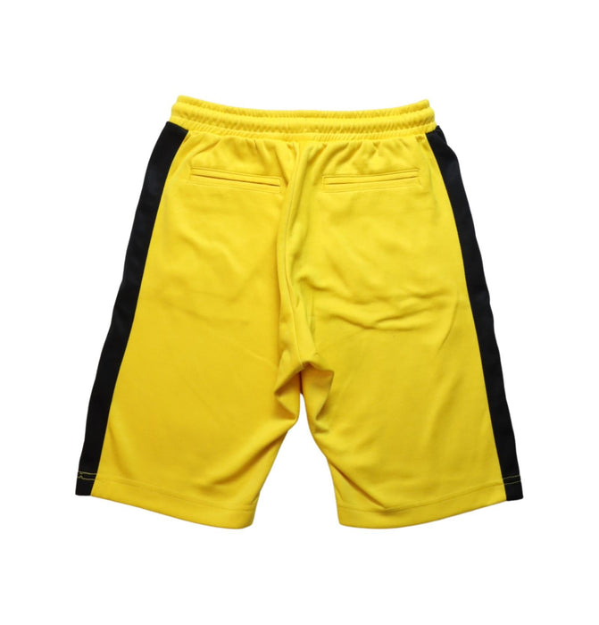 A Yellow Shorts from Diesel in size 10Y for boy. (Back View)