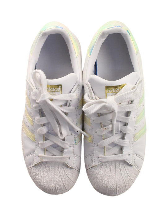 A White Sneakers from Adidas in size 11Y for boy. (Back View)
