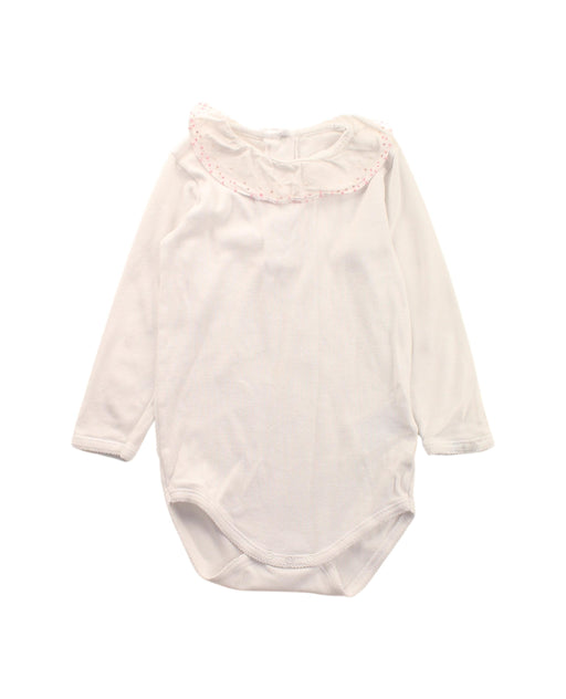 A White Long Sleeve Bodysuits from Bonpoint in size 2T for girl. (Front View)