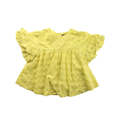 A Yellow Short Sleeve Tops from Velveteen in size 5T for girl. (Front View)