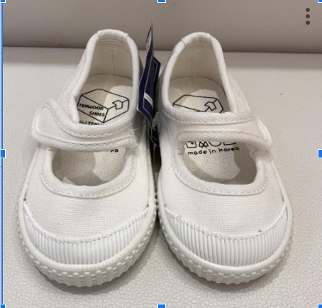 A White Flats from Tenwood in size 10Y for girl. (Front View)