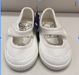 A White Flats from Tenwood in size 10Y for girl. (Front View)