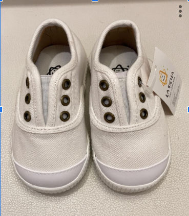 A White Slip Ons from Lastella in size 7Y for neutral. (Front View)