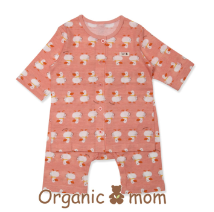 A Orange Pyjama Sets from Organic Mom in size 6-12M for neutral. (Front View)