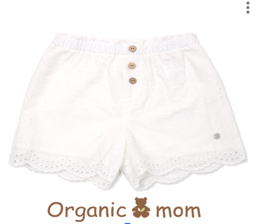 A Ivory Shorts from Organic Mom in size 4T for girl. (Front View)