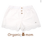 A Ivory Shorts from Organic Mom in size 4T for girl. (Front View)