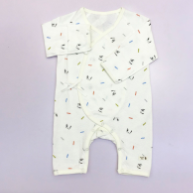A Ivory Long Sleeve Rompers from Organic Mom in size 0-3M for boy. (Front View)