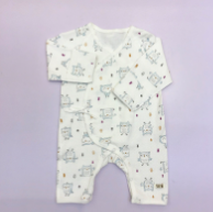 A White Long Sleeve Rompers from Organic Mom in size 0-3M for boy. (Front View)