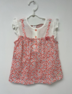 A Pink Sleeveless Tops from Organic Mom in size 2T for girl. (Front View)