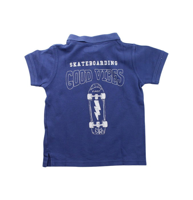 A Blue Short Sleeve Polos from La Compagnie des Petits in size 4T for boy. (Back View)