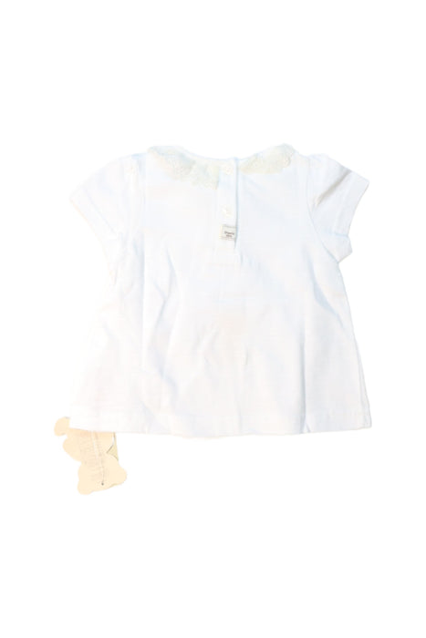 A White Short Sleeve Tops from Organic Mom in size 6-12M for girl. (Back View)