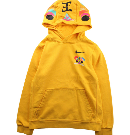 A Yellow Hooded Sweatshirts from Nike in size 10Y for girl. (Front View)