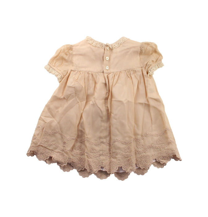 A Beige Short Sleeve Dresses from Gucci in size 3-6M for girl. (Back View)