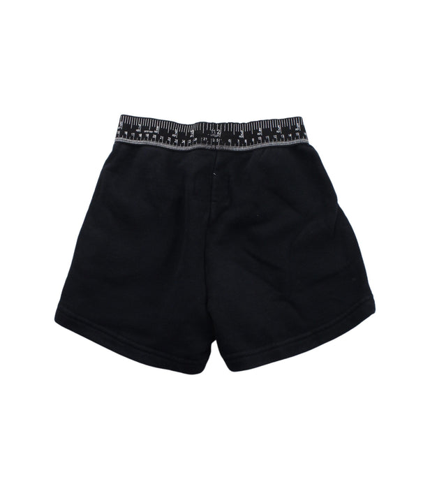 A Black Shorts from Nununu in size 6T for boy. (Back View)