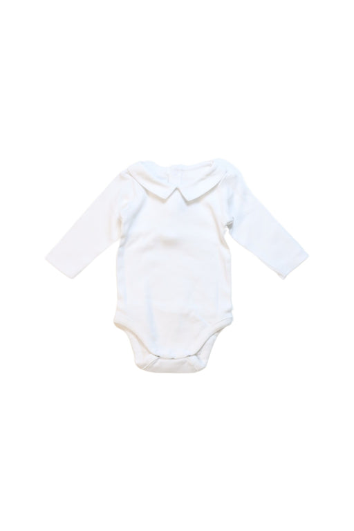 A White Long Sleeve Bodysuits from Jacadi in size 0-3M for neutral. (Front View)