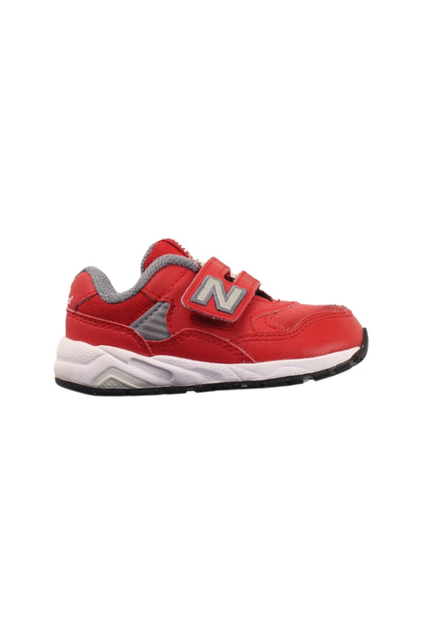 A Red Sneakers from New Balance in size 18-24M for boy. (Front View)