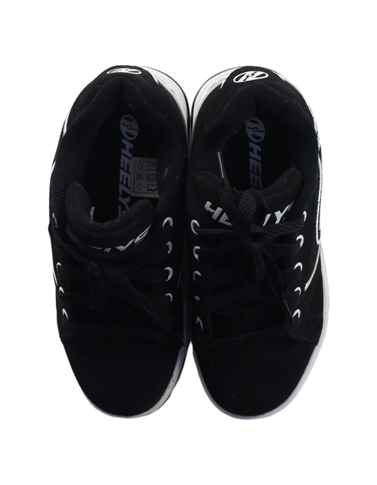 A Black Sneakers from Heelys in size 7Y for boy. (Back View)
