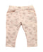 A White Sweatpants from Carrément Beau in size 3-6M for girl. (Front View)