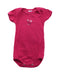 A Pink Short Sleeve Bodysuits from Petit Bateau in size 0-3M for girl. (Front View)