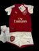 A Red Shorts Sets from Puma in size 6-12M for boy. (Front View)